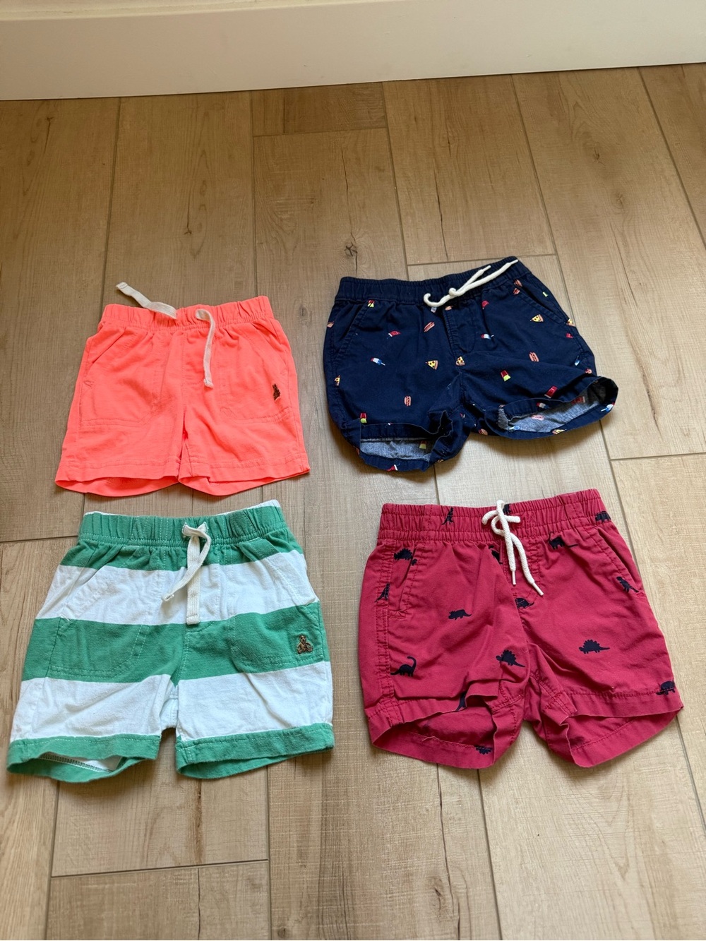 GAP Kids Four-Pack Drawstring Shorts in Coral, Navy, Green, Raspberry